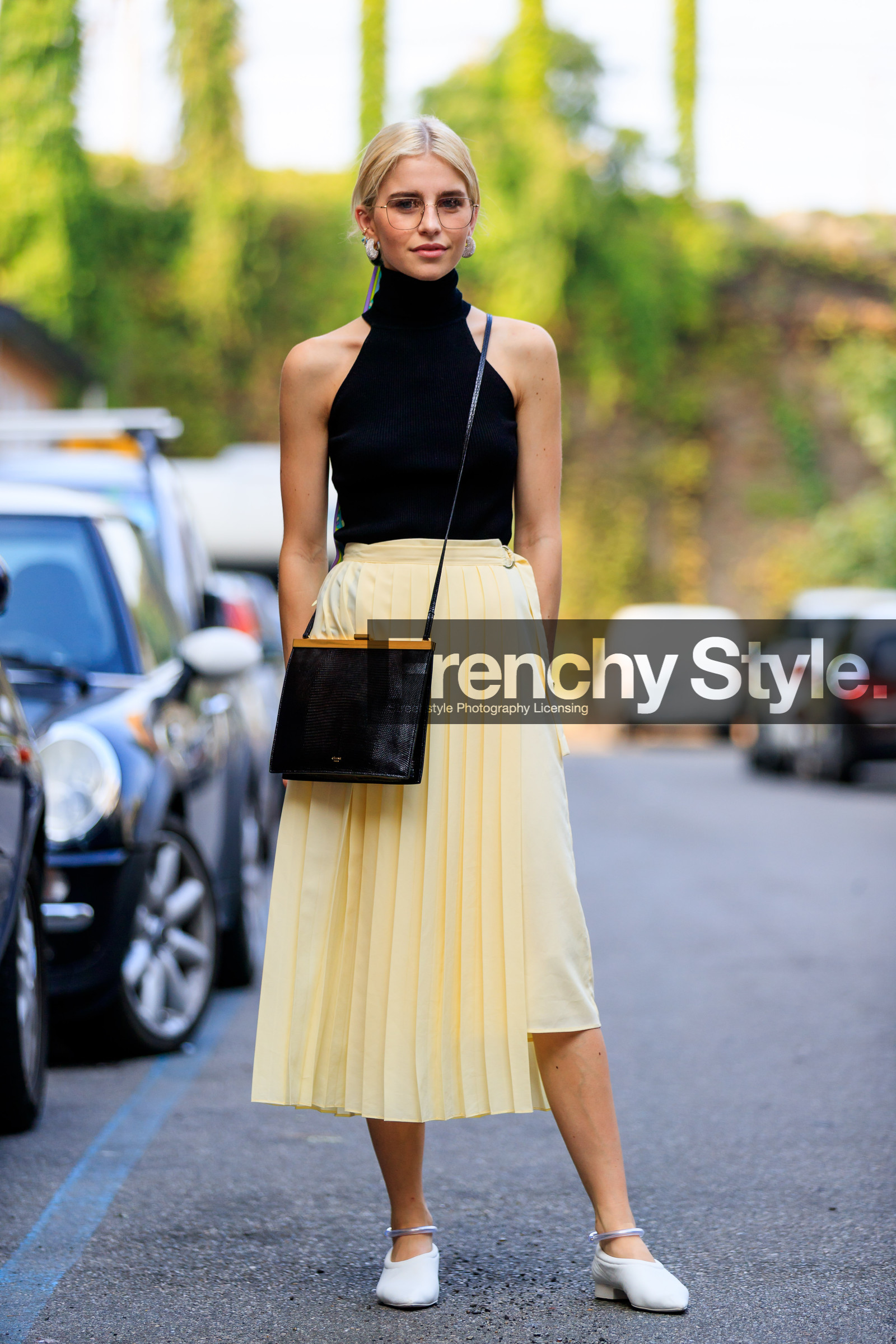 black bag, black top, caro daur, earrings, leather bag, leather shoes, pleated skirt, sunglasses, white shoes, yellow skirt, fashion week, frenchystyle, FW, jonathan paciullo, street style, MFW, MILAN, SPRING SUMMER 2019, SS 19, vertical, full length
