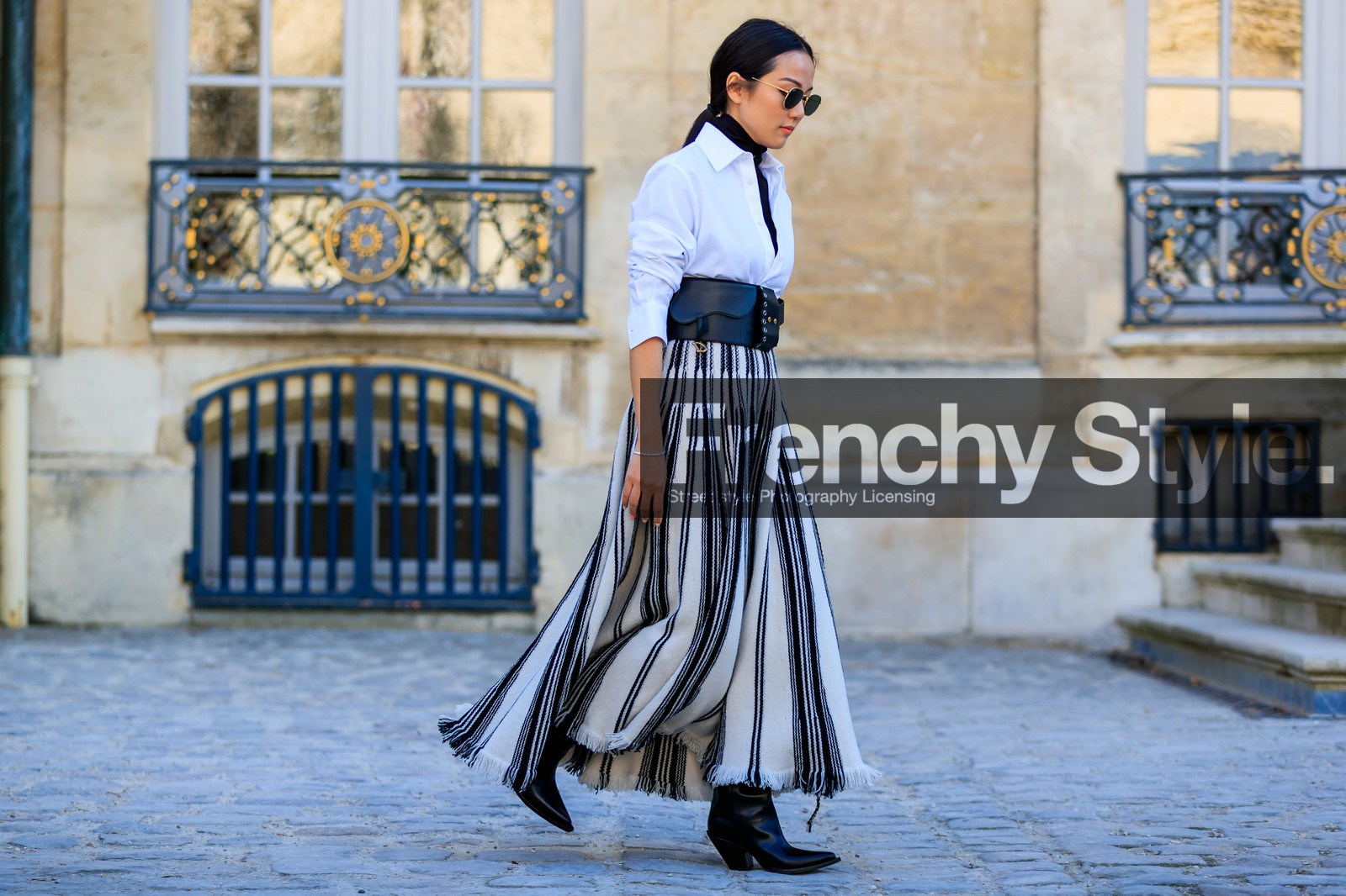 black and white, black bag, black belt, black shoes, black turtleneck, christian dior, graphic skirt, iphone, leather bag, leather belt, leather shoes, printed skirt, striped skirt, sunglasses, white shirt, white skirt, yoyo cao, fashion week, frenchystyle, FW, jonathan paciullo, street style, PFW, PARIS, AUTUMN WINTER 2019-2020, AW 19-20, FALL WINTER 2019-2020, FW 19-20, horizontal, atmosphere details, full length