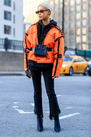 black bag, black belt, black denim, black shoes, black sweater, denim pants, fanny pack, graphic jacket, high heels, hoodie, jeans, leather bag, leather belt, leather shoes, orange jacket, printed jacket, sunglasses, trousers, street style, jonathan paciullo, FW, frenchystyle, fashion week, NYFW, NEW YORK, AUTUMN WINTER 2018-2019, AW 18-19, FALL WINTER 2018-2019, FW 18-19, vertical, full length, vanessa hong