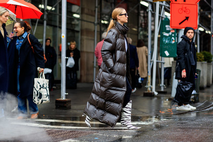 pernille teisbaek, brown coat, down jacket, celine sunglasses, futurist shape sunglasses, black sunglasses, long coat, white boots, fur boots, striped boots, high boots, high heels boots, fashion week, frenchystyle, FW, jonathan paciullo, street style, NYFW, NEW YORK, AUTUMN WINTER 2020-2021, FALL WINTER 2020-2021, FW 20-21, horizontal, atmosphere details, full length