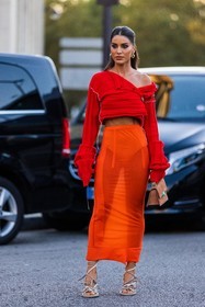 acne studios, acne studios bag, acne studios look, bag, beige sandals, Camila Coelho, color, crop knit, gold earrings, knit, long skirt, long sleeves, orange bag, orange skirt, red knitwear, sandals, skirt, transparent skirt, street style, jonathan paciullo, FW, frenchystyle, fashion week, PFW, PARIS, SPRING SUMMER 2022, SS 22, vertical, full length