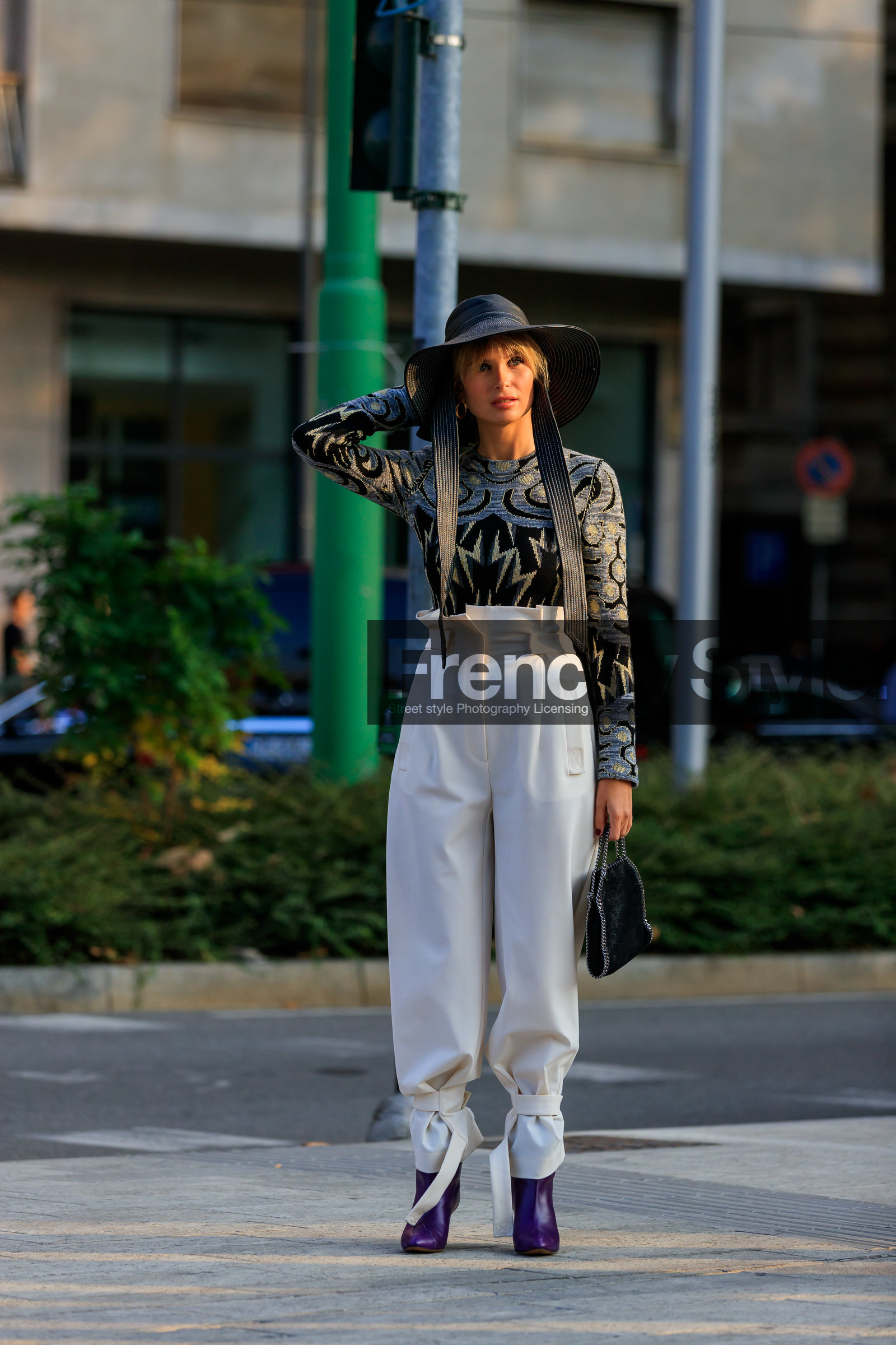xnenia adonts, black hat, jacquard pullover, tight pullover, grey pullover, white pants, carrot pants, high waist pants, paper bag pants, stella mccartney bag, chain strap bag, hand bag, purple boots, high heels boots, fashion week, frenchystyle, FW, jonathan paciullo, street style, MFW, MILAN, SPRING SUMMER 2020, SS 20