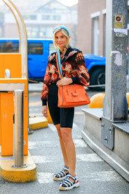 black and white shoes, black shirt, black shorts, fendi, graphic jacket, headband, leather bag, leather shoes, orange bag, printed jacket, printed shirt, red shirt, white shoes, xenia adonts, MILAN, MFW, fashion week, frenchystyle, FW, jonathan paciullo, street style, AUTUMN WINTER 2019-2020, AW 19-20, FALL WINTER 2019-2020, FW 19-20, vertical, full length