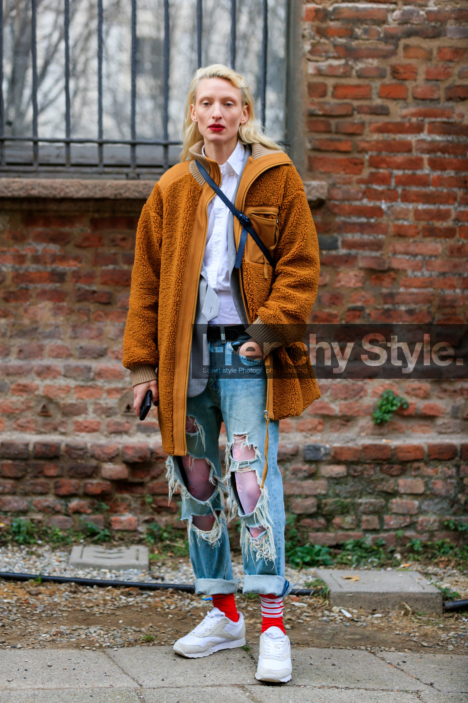 black belt, blue denim, camel jacket, denim pants, jeans, leather shoes, model, red socks, ripped pants, shearling, trousers, white shirt, white shoes, white sneakers, MILAN, MFW, fashion week, frenchystyle, FW, jonathan paciullo, street style, AUTUMN WINTER 2019-2020, AW 19-20, FALL WINTER 2019-2020, FW 19-20, vertical, full length