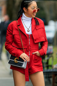 black and white bag, braids, graphic bag, leather bag, necklace, printed bag, red belt, red jacket, red romper, sunglasses, turtleneck sweater, white sweater, yuwei zhangzou, MILAN, MFW, fashion week, frenchystyle, FW, jonathan paciullo, street style, AUTUMN WINTER 2019-2020, AW 19-20, FALL WINTER 2019-2020, FW 19-20, vertical, atmosphere details, detail