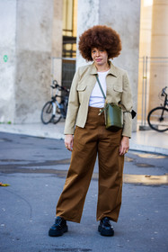 afro hairstyle, bag, beige jacket, black shoes, brown pants, crossbody bag, dr martens, freckles, hairstyle, jacket, khaki bag, large pants, leather bag, leather shoes, Odile Gautreau, pants, ribbed top, white top, fashion week, frenchystyle, FW, jonathan paciullo, street style, PFW, PARIS, SPRING SUMMER 2022, SS 22, vertical, full length