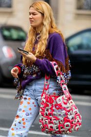 denim, purple sweatshirt, fringe sweatshirt, brown sweathirt, pearl embroidered sweatshirt, plastic pants, white jeans, floral printed jeans, floral embroidered jeans, red leather bag, white suede bag, plaited bag, fashion week, frenchystyle, FW, jonathan paciullo, street style, PFW, PARIS, vertical, atmosphere details, detail