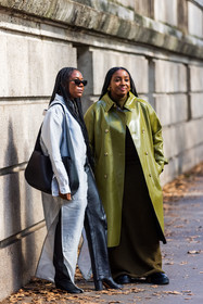 bag, black bag, black pants, boots, coat, dress, duo, green coat, Jessica Willis, kakhi dress, leather bag, leather coat, leather pants, Lindsay Peoples Wagner, long dress, long shirt, oversize bag, pants, shirt, sunglasses, white shirt, street style, jonathan paciullo, FW, frenchystyle, fashion week, PFW, PARIS, SPRING SUMMER 2022, SS 22, vertical, full length