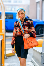 black shirt, black shorts, fendi, graphic jacket, headband, leather bag, orange bag, printed jacket, printed shirt, red shirt, xenia adonts, MILAN, MFW, fashion week, frenchystyle, FW, jonathan paciullo, street style, AUTUMN WINTER 2019-2020, AW 19-20, FALL WINTER 2019-2020, FW 19-20, vertical, atmosphere details, detail