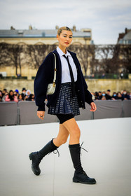 white shirt, black tie, white bag, black jacket, school girl look, mini skirt, pleated skirt, black boots, biker shorts, sutds skirts, dior, laced boots, amalie gassmann, fashion week, frenchystyle, FW, jonathan paciullo, street style, AUTUMN WINTER 2022-2023, FALL WINTER 2022_2023, FW 22-23, PFW, PARIS, vertical, full length