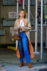 sabina socol, beige trench coat, camel suede boots, brown leather bag, crossbody bag, tory burch bag, blue jeans, cropped jeans, flare jeans, white top, orange trench coat, fashion week, frenchystyle, FW, jonathan paciullo, street style, FALL WINTER 2020-2021, AUTUMN WINTER 2020-2021, FW 20-21, vertical, full length, NYFW, NEW YORK