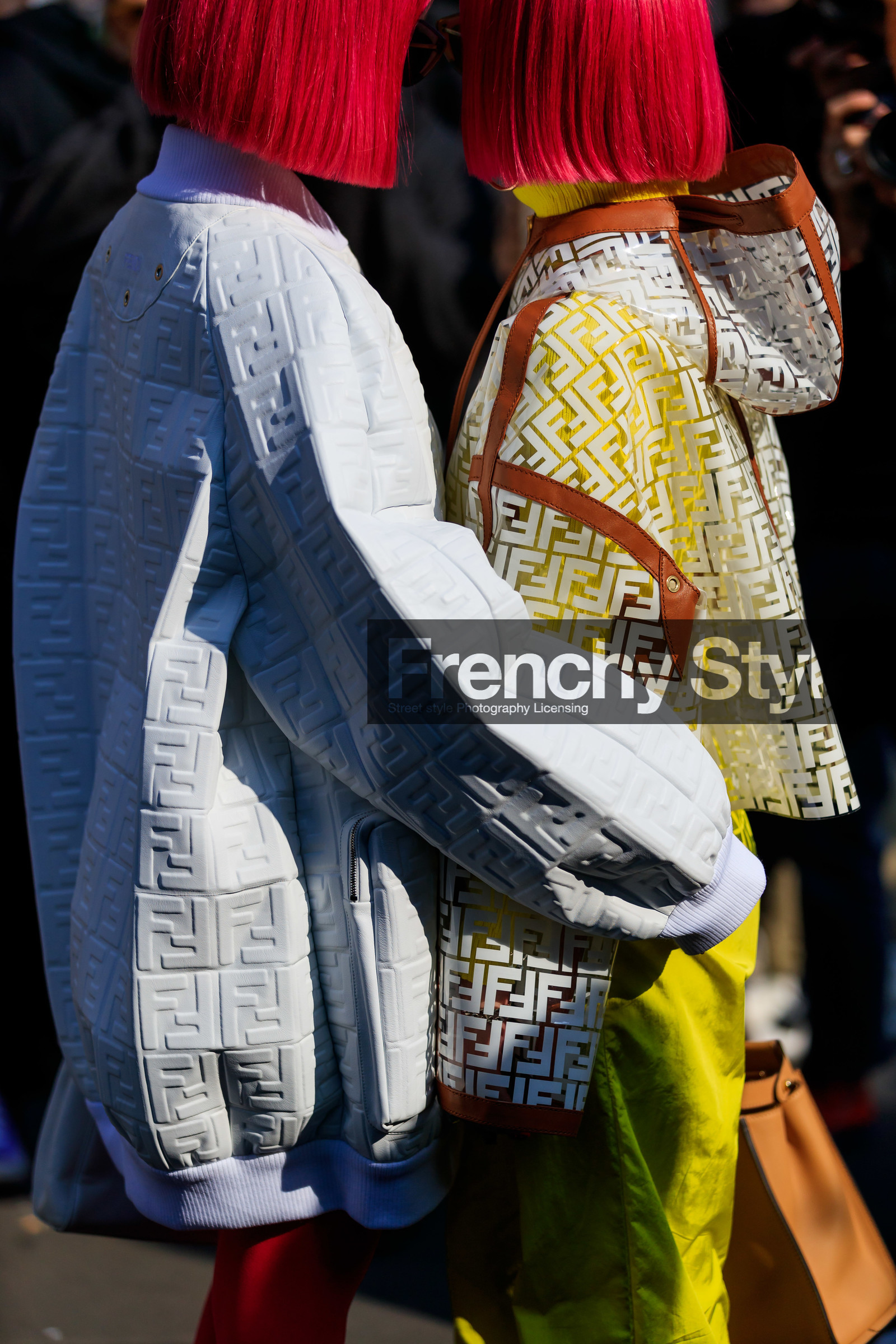 Ami and Aya Suzuki, dyed hair, fendi, graphic jacket, hood, monogram, pink hair, printed jacket, transparent jacket, trousers, white jacket, yellow pants, MILAN, MFW, fashion week, frenchystyle, FW, jonathan paciullo, street style, AUTUMN WINTER 2019-2020, AW 19-20, FALL WINTER 2019-2020, FW 19-20, vertical, atmosphere details, detail