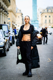 black cropped top, tattoos, pony tails, black puffed jacket, black boots, black tong, black trousers, prada bag, mint bag, mini bag, hera pradel, fashion week, frenchystyle, FW, jonathan paciullo, street style, AUTUMN WINTER 2022-2023, FALL WINTER 2022_2023, FW 22-23, PFW, PARIS, vertical, full length