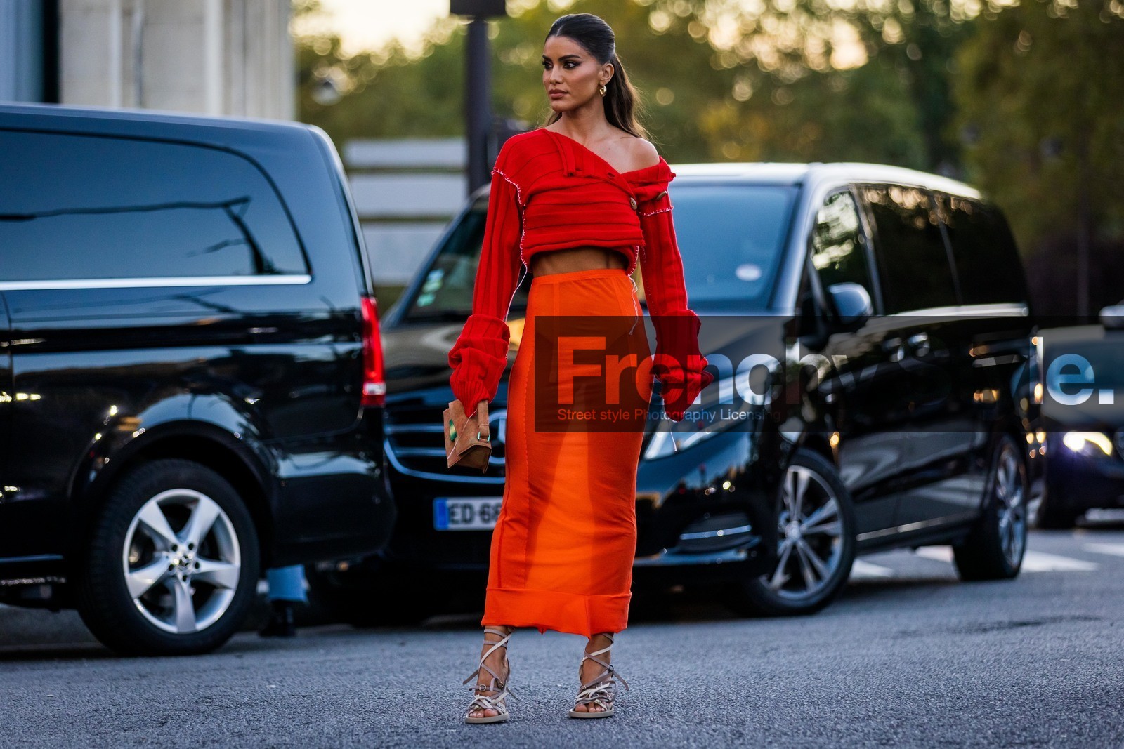acne studios, acne studios bag, acne studios look, bag, beige sandals, Camila Coelho, color, crop knit, gold earrings, knit, long skirt, long sleeves, orange bag, orange skirt, red knitwear, sandals, skirt, transparent skirt, street style, jonathan paciullo, FW, frenchystyle, fashion week, PFW, PARIS, SPRING SUMMER 2022, SS 22, horizontal, atmosphere details, full length