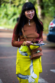 acne bag, bag, color, orange bag, print, printed skirt, red turtleneck, ribbed turtleneck, skirt, Susie Lau, turtleneck, yellow skirt, street style, jonathan paciullo, FW, frenchystyle, fashion week, PFW, PARIS, SPRING SUMMER 2022, SS 22, vertical, atmosphere details