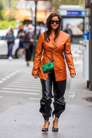 bag, black heels, black pants, black sunglasses, Gili Biegun, green bag, gucci bag, heels, jacket, leather bag, leather jacket, leather pants, orange jacket, pants, quilted bag, sunglasses, street style, jonathan paciullo, FW, frenchystyle, fashion week, PFW, PARIS, SPRING SUMMER 2022, SS 22, vertical, full length