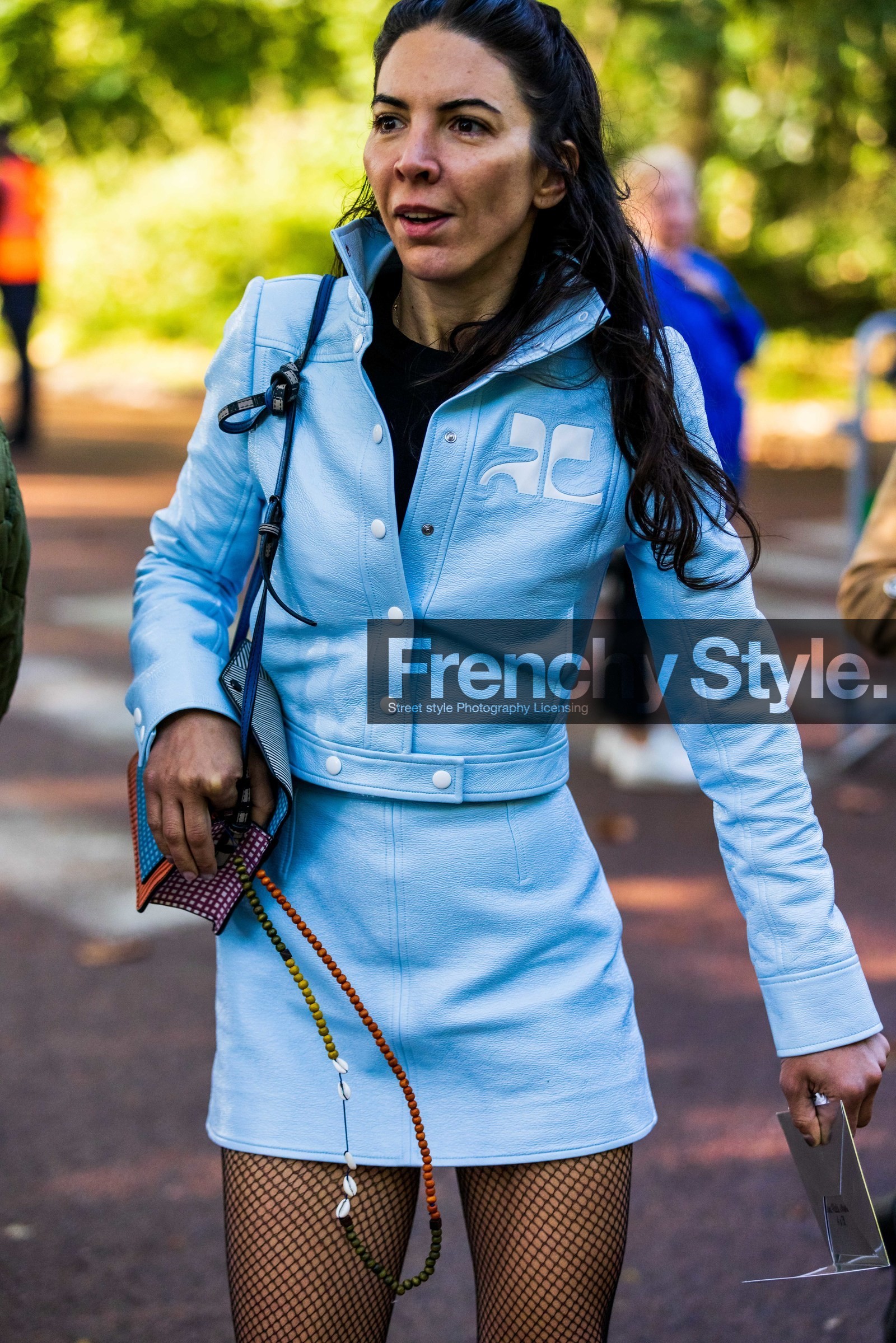 blue jacket, blue skirt, courreges jacket, courreges look, fishnet tights, jacket, leather jacket, leather skirt, mini skirt, multicolor bag, pastel blue, skirt, street style, jonathan paciullo, FW, frenchystyle, fashion week, PFW, PARIS, SPRING SUMMER 2022, SS 22, vertical, atmosphere details