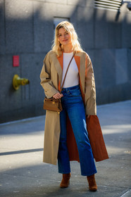 sabina socol, beige trench coat, camel suede boots, brown leather bag, crossbody bag, tory burch bag, blue jeans, cropped jeans, flare jeans, white top, orange trench coat, fashion week, frenchystyle, FW, jonathan paciullo, street style, FALL WINTER 2020-2021, AUTUMN WINTER 2020-2021, FW 20-21, vertical, full length, NYFW, NEW YORK