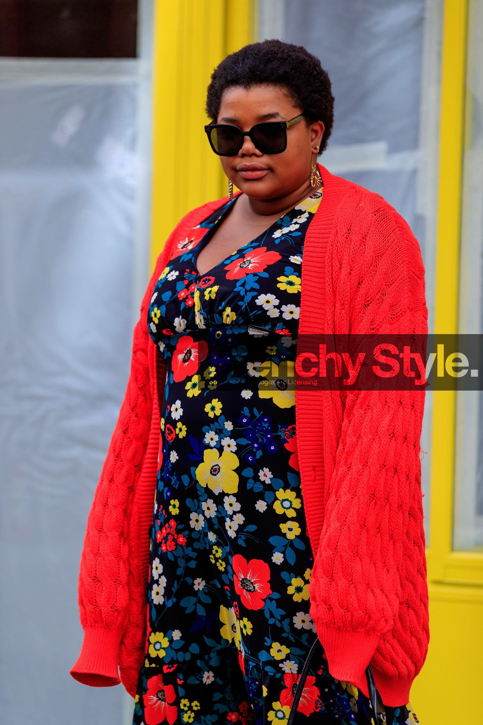 gabriella karefa johnson, red cardigan, red dress, black dress, yellow dress, multicolor dress, low necked dress, floral printed dress, square shape glasses, big sunglasses, black sunglasses, golden earrings, dangling earrings, animal shape earrings, fashion week, frenchystyle, FW, jonathan paciullo, street style, PFW, PARIS, vertical, atmosphere details, detail