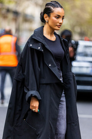 Amina Muaddi, back, black coat, braid, bun, coat, green nails, hairstyle, nailsart, ring, street style, jonathan paciullo, FW, frenchystyle, fashion week, PFW, PARIS, SPRING SUMMER 2022, SS 22, vertical, atmosphere details