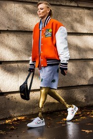 bag, beltbag, black bag, bomber, color, grey shorts, jogging, lacoste look, Lauren Wasser, orange bomber, shorts, sneakers, stripes, white sneakers, lacoste, fashion week, frenchystyle, FW, jonathan paciullo, street style, PFW, PARIS, SPRING SUMMER 2022, SS 22, vertical, full length