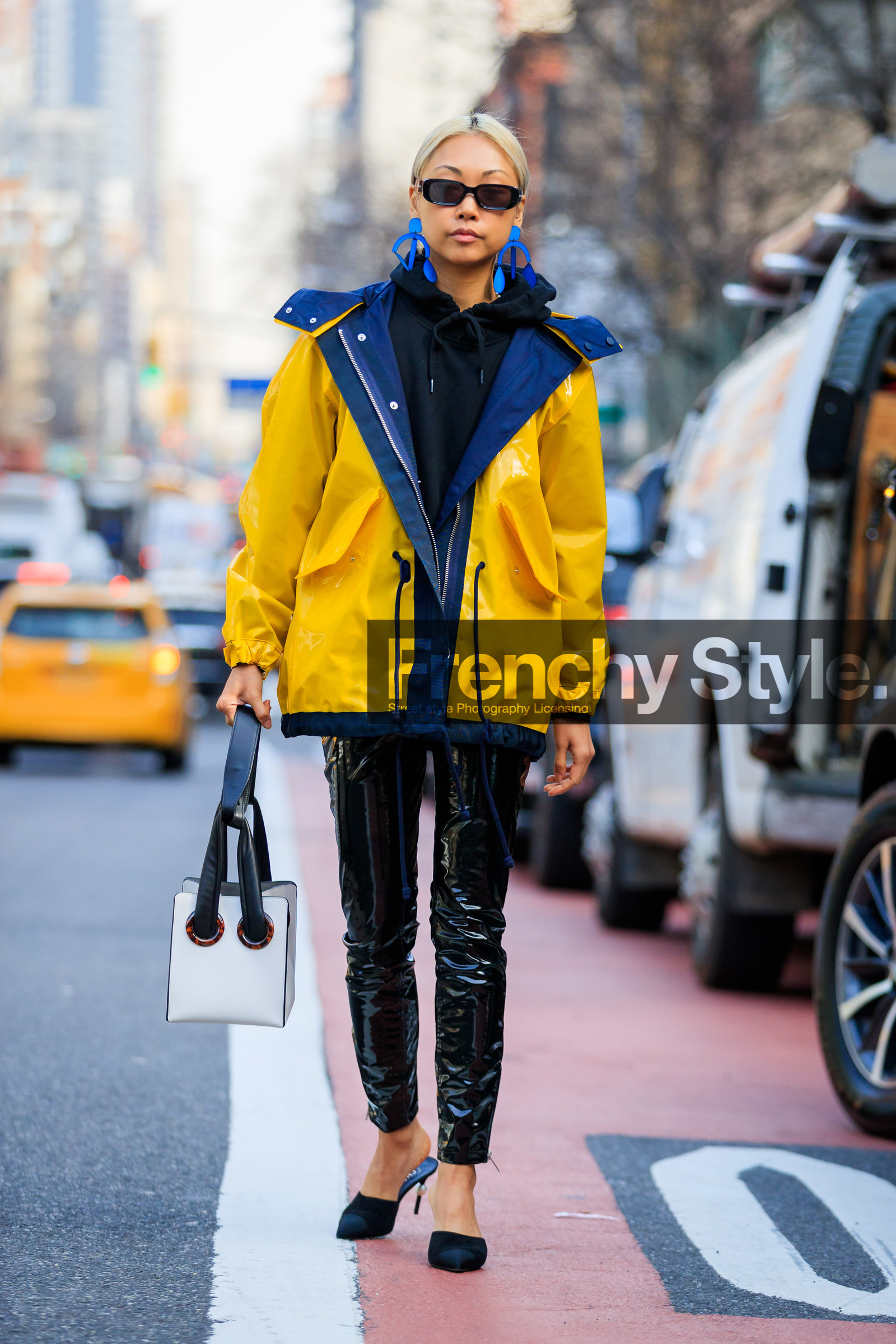 black and white bag, black mules, black pants, black shoes, black sweater, chanel, earrings, graphic bag, high heels, hoodie, leather bag, leather pants, leather shoes, printed bag, sunglasses, trousers, yellow jacket, street style, jonathan paciullo, FW, frenchystyle, fashion week, NYFW, NEW YORK, AUTUMN WINTER 2018-2019, AW 18-19, FALL WINTER 2018-2019, FW 18-19, vertical, full length, vanessa hong