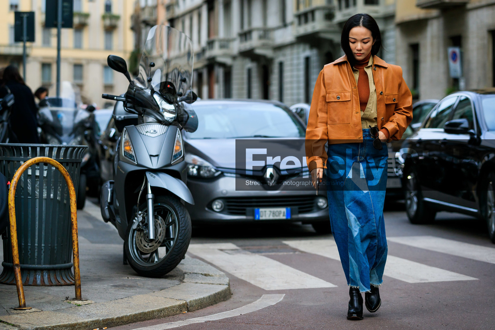 beige shirt, black shoes, blue denim, brown sweater, camel jacket, denim skirt, graphic skirt, leather jacket, leather shoes, printed skirt, yoyo cao, MILAN, MFW, fashion week, frenchystyle, FW, jonathan paciullo, street style, AUTUMN WINTER 2019-2020, AW 19-20, FALL WINTER 2019-2020, FW 19-20, atmosphere details, full length, horizontal