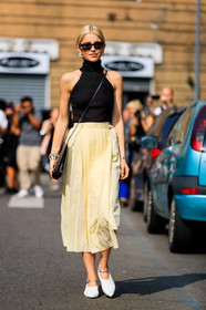 black bag, black top, caro daur, earrings, leather bag, leather shoes, pleated skirt, sunglasses, white shoes, yellow skirt, fashion week, frenchystyle, FW, jonathan paciullo, street style, MFW, MILAN, SPRING SUMMER 2019, SS 19, vertical, full length