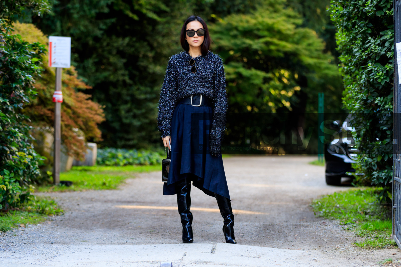 atmosphere details, black bag, black belt, black shoes, blue skirt, fashion week, frenchystyle, full length, FW, grey sweater, high boots, high heels, horizontal, jonathan paciullo, leather bag, leather shoes, MFW, MILAN, SPRING SUMMER 2018, SS 18, street style, sunglasses, varnished leather shoes, yoyo cao