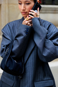grey jacket, striped jacket, patchwork jacket, oversize jacket, black bag, prada bag, golden ring, signet ring, louis vuitton ring, close up detail, alexandra guerain, fashion week, frenchystyle, FW, jonathan paciullo, street style, PFW, PARIS, SPRING SUMMER 2022, SS 22, vertical, atmosphere details, detail