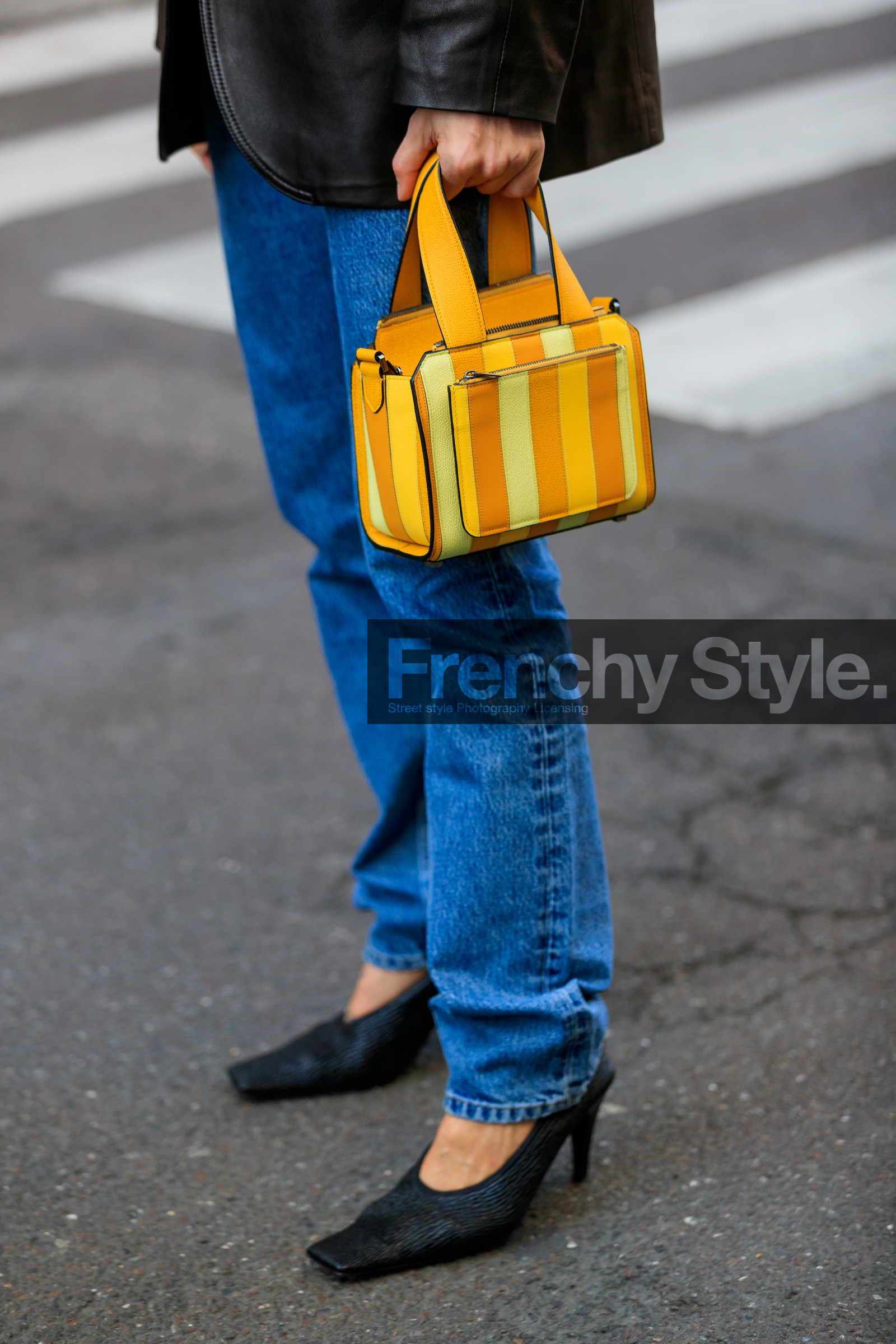 blue jeans, yellow leather bag, striped bag, hand bag, black leather shoes, high heels shoes, squared toed shoes, bag detail, legs detail, close up detail, fashion week, frenchystyle, FW, jonathan paciullo, street style, MFW, MILAN, AUTUMN WINTER 2020-2021, FALL WINTER 2020-2021, FW 20-21, vertical, atmosphere details, detail