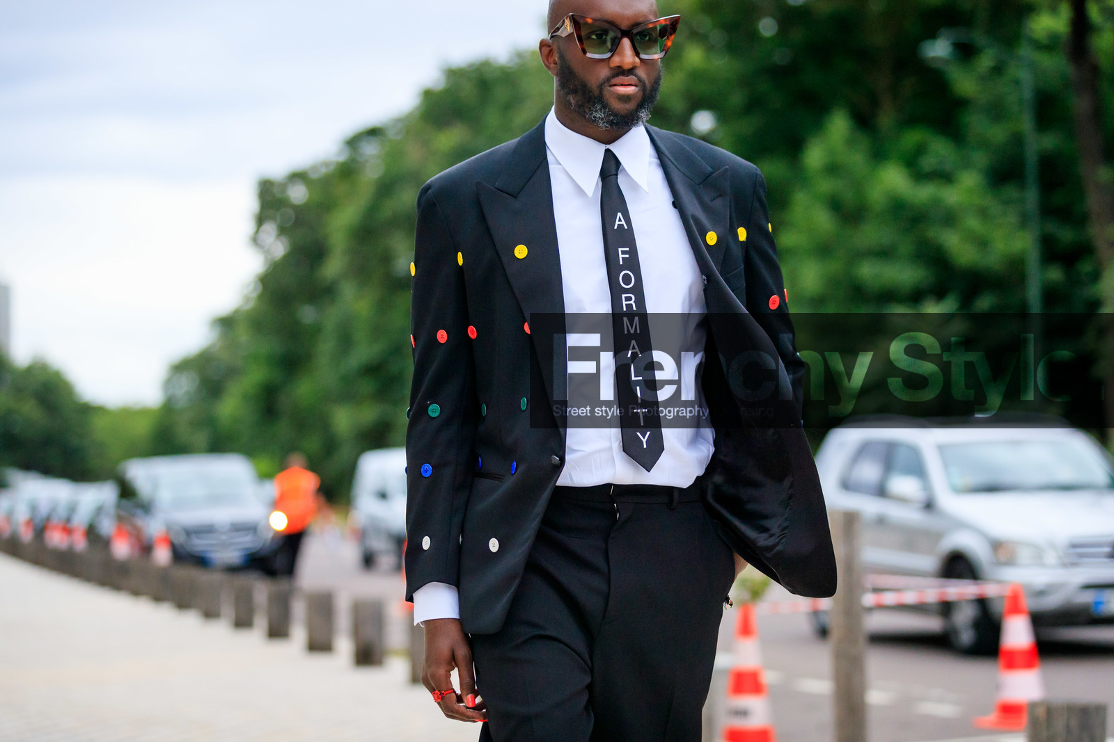 black jacket, black suits, black tie, black pants, white shirt, button details, button jacket, multicolor jacket, polka dots jacket, letter printed tie, scale sunglasses, louis vuitton sunglasses, black sneackers, yellow sneakers, virgil abloh, fashion week, frenchystyle, FW, jonathan paciullo, street style, PFW, PARIS, AUTUMN WINTER 2021-2022, FALL WINTER 2021-2022, FW 21-22, atmosphere details, horizontal, detail