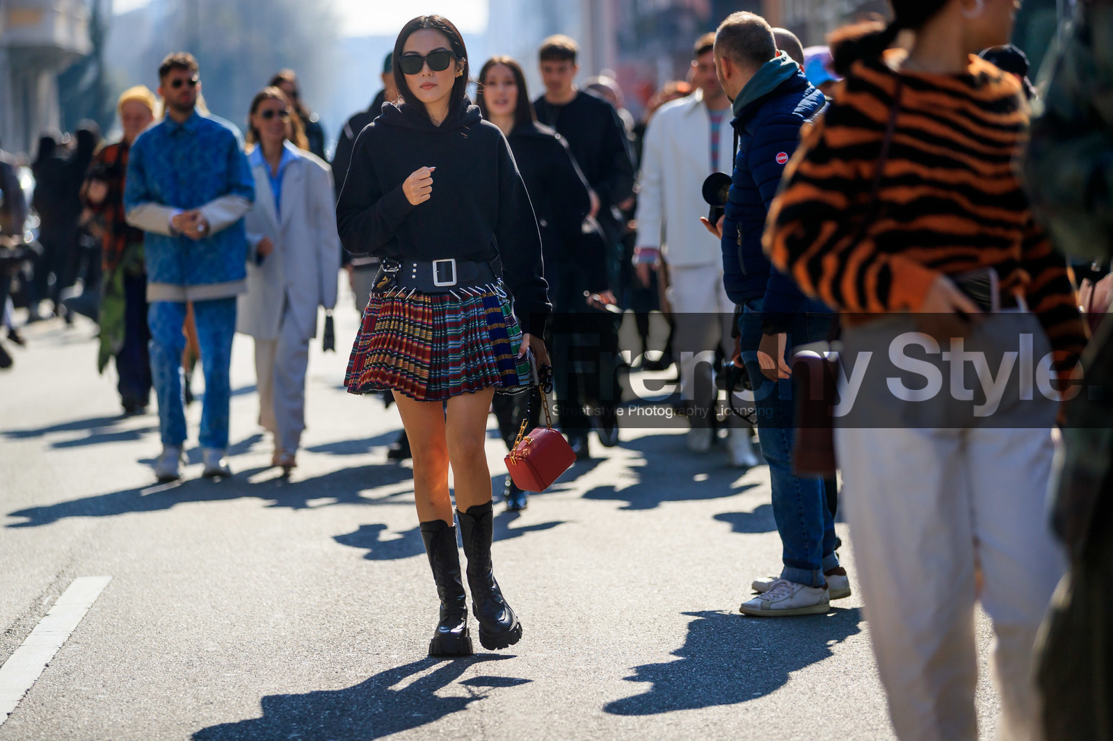 yoyo cao, mini skirt, pleated skirt, checked skirt, black leather belt, black hoodie, black leather boots, red leather bag, multicolor skirt, big strap bag, flat boots, prada boots, big sole boots, laced boots, fashion week, frenchystyle, FW, jonathan paciullo, street style, MFW, MILAN, AUTUMN WINTER 2020-2021, FALL WINTER 2020-2021, FW 20-21, horizontal, atmosphere details, full length
