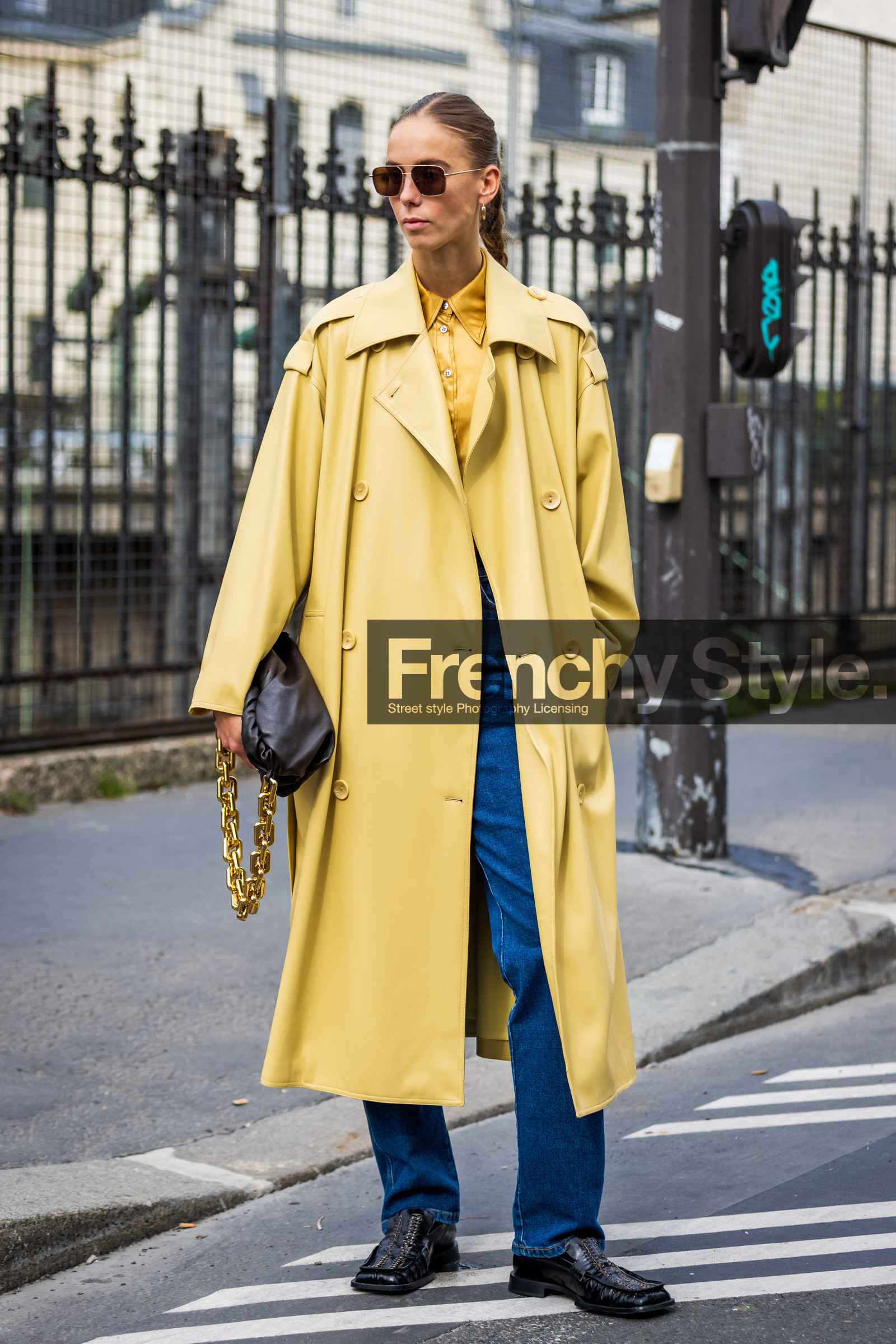 aviator sunglasses, bag, black bag, black loafers, blue jean, bottega veneta bag, chain bag, denim, Hilda Sandstrom, jean, leather loafers, leather trench, loafers, shirt, sunglasses, trench, yellow shirt, yellow trench, fashion week, frenchystyle, FW, jonathan paciullo, street style, PFW, PARIS, SPRING SUMMER 2022, SS 22, vertical, full length
