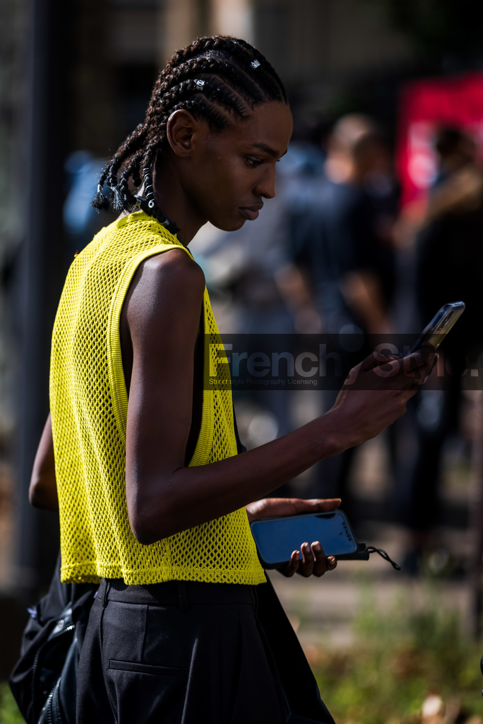 afro braid, black pants, braid, color, hairstyle, menswear, top, yellow top, smartphone, street style, jonathan paciullo, FW, frenchystyle, fashion week, PFW, PARIS, SPRING SUMMER 2022, SS 22, vertical, atmosphere details