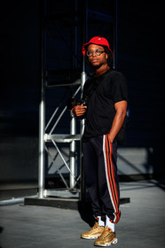 black pants, black t shirt, camera, fashion week, frenchystyle, full length, FW, golden sneakers, jonathan paciullo, kangol, nabile quenum, NEW YORK, nike, NYFW, red hat, SPRING SUMMER 2018, SS 18, street style, sweatpants, trousers, vertical, white socks
