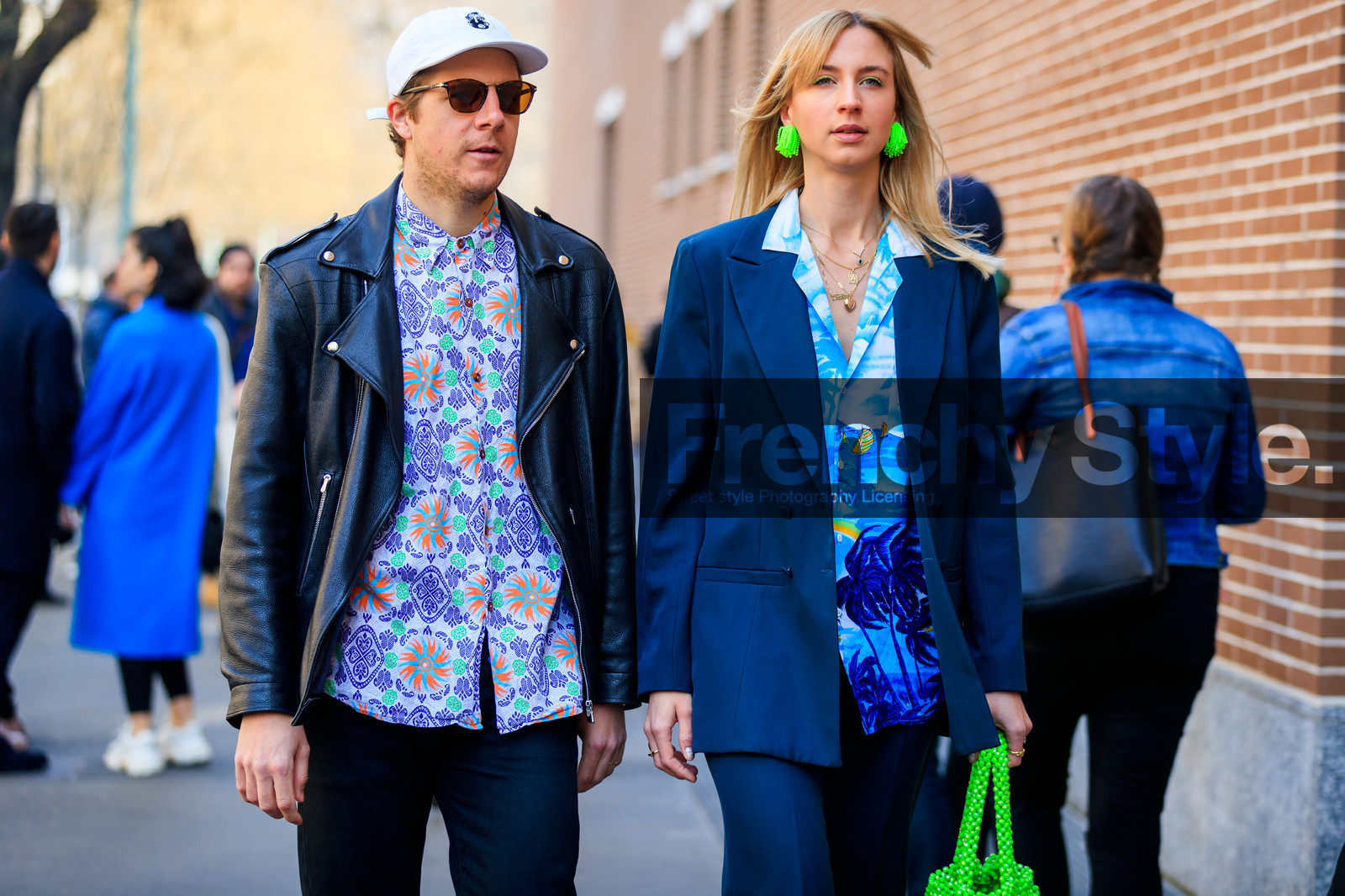 black jacket, black perfecto, blazer, blue jacket, blue shirt, earrings, graphic shirt, green bag, leather jacket, leather perfecto, navy pants, neon, printed shirt, sunglasses, trousers, white cap, MILAN, MFW, fashion week, frenchystyle, FW, jonathan paciullo, street style, AUTUMN WINTER 2019-2020, AW 19-20, FALL WINTER 2019-2020, FW 19-20, atmosphere details, detail, horizontal
