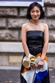 black bustier, black skirt, black top, bustier, gold, leather bustier, leather top, loewe bag, loewe look, patchwork, printed skirt, skirt, top, white bag, street style, jonathan paciullo, FW, frenchystyle, fashion week, PFW, PARIS, SPRING SUMMER 2022, SS 22, vertical, atmosphere details