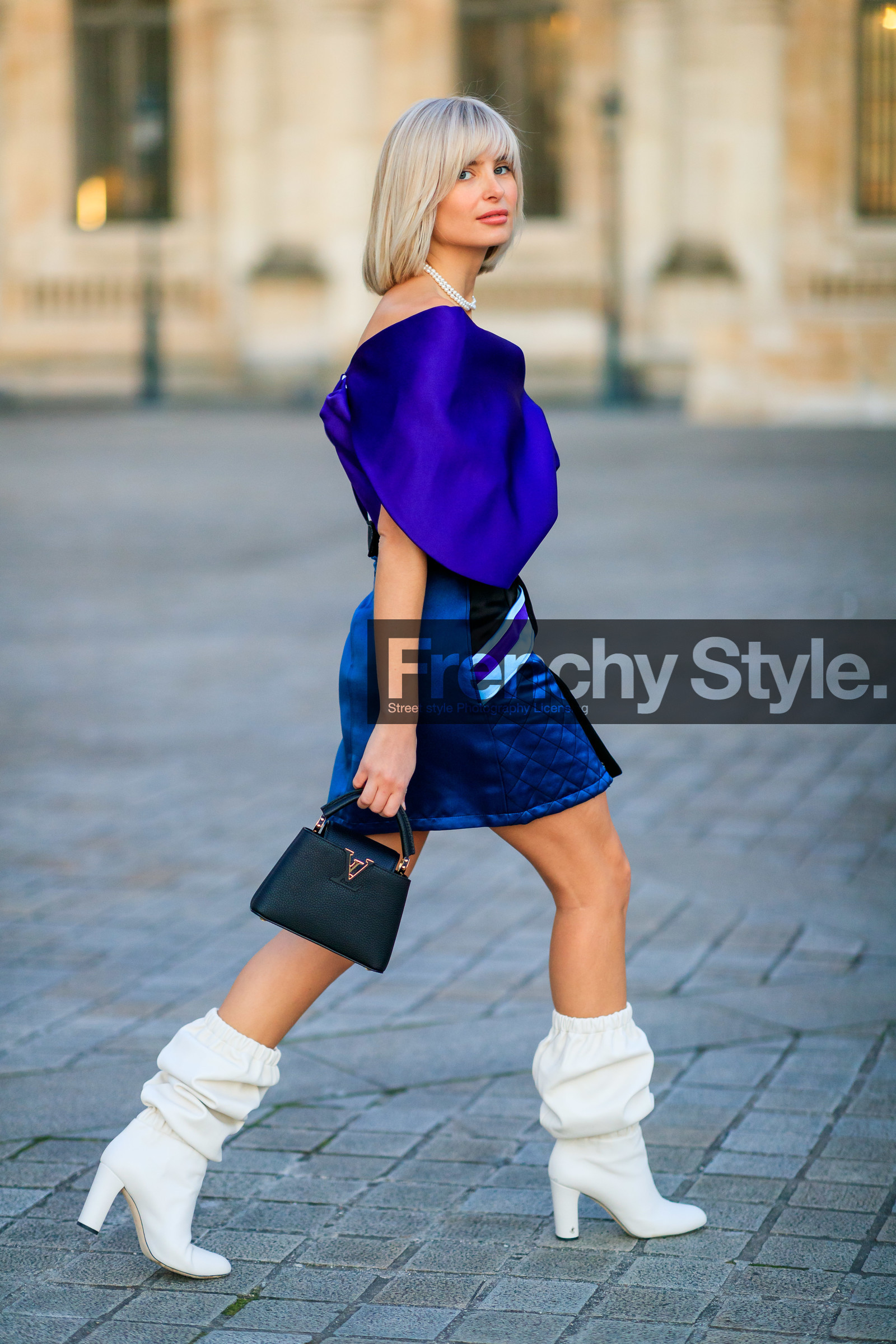 xenia adonts, louis vuitton bag, louis vuitton skirt, blue blouse, blue top, blue skirt, blue cape, satin blouse, satin skirt, satin top, satin cape, striped skirt, white skirt, quilted skirt, mini skirt, half shoulder blouse, half soulder top, low necked blouse, low necked top, white leather boots, high heels boots, black leather bag, hand bag, pearl necklace, multi necklace, fashion week, frenchystyle, FW, jonathan paciullo, street style, PFW, PARIS, vertical, full length