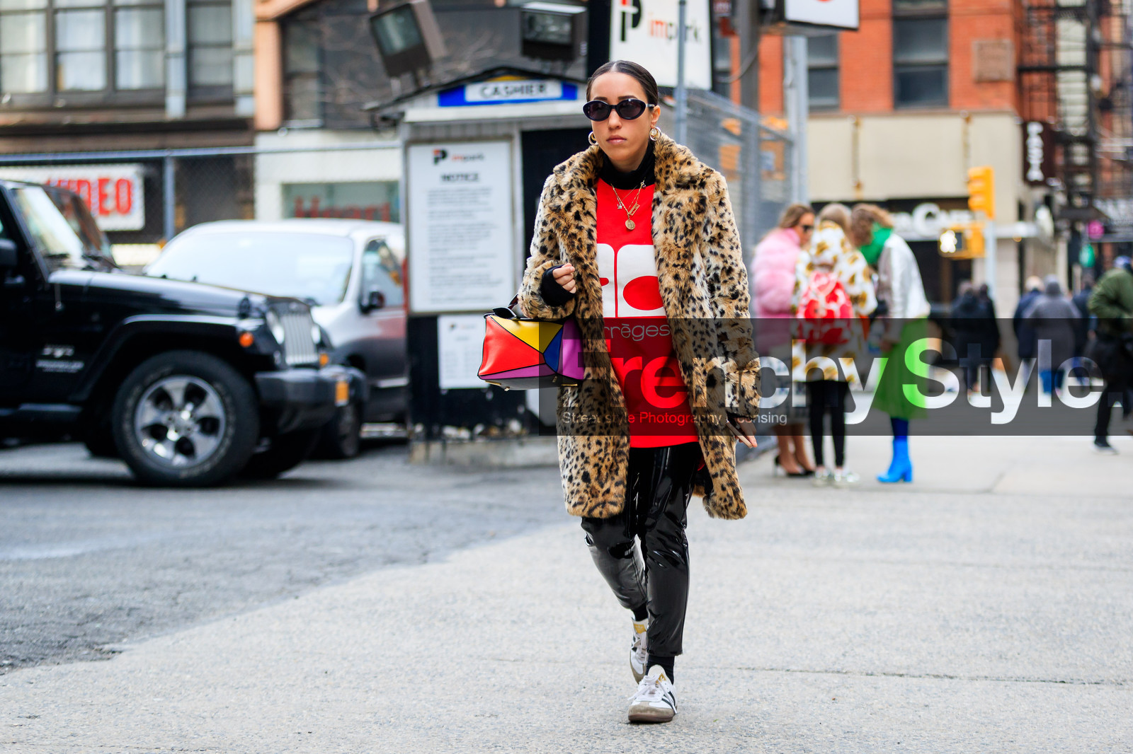 adidas, animal print, black pants, brown jacket, courrèges, earrings, fur jacket, graphic bag, graphic jacket, leather bag, leather pants, leather shoes, leopard print, loewe, multicolor bag, necklace, printed bag, printed jacket, red sweater, sunglasses, trousers, white sneakers, street style, jonathan paciullo, FW, frenchystyle, fashion week, NYFW, NEW YORK, AUTUMN WINTER 2018-2019, AW 18-19, FALL WINTER 2018-2019, FW 18-19, atmosphere details, horizontal, full length
