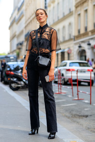 black shirt, black top, black jeans, black leather bag, black leather boots, black total look, freckles, short sleeves shirt, sheer shirt, embroidered shirt, acne studios shirt, acne studios bag, black polish boots, varnished boots, vinyl boots, high heels boots, flare jeans, denim, cropped top, strapless top, bra, black bra, crossbody bag, knot details bag, strassed top, strassed bra, golden earrings, hoop earrings, maeva marshall, fashion week, frenchystyle, FW, jonathan paciullo, street style, PFW, PARIS, SPRING SUMMER 2022, SS 22, vertical, full length