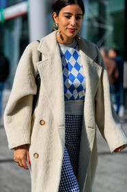 bettina looney, black and white, blue sweater, checked, earrings, Fur coat, gingham, graphic pants, graphic sweater, plaid, printed pants, printed sweater, trousers, white coat, MILAN, MFW, fashion week, frenchystyle, FW, jonathan paciullo, street style, AUTUMN WINTER 2019-2020, AW 19-20, FALL WINTER 2019-2020, FW 19-20, vertical, atmosphere details, detail