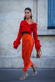 acne studios, acne studios bag, acne studios look, bag, beige sandals, Camila Coelho, color, crop knit, gold earrings, knit, long skirt, long sleeves, orange bag, orange skirt, red knitwear, sandals, skirt, transparent skirt, street style, jonathan paciullo, FW, frenchystyle, fashion week, PFW, PARIS, SPRING SUMMER 2022, SS 22, vertical, full length