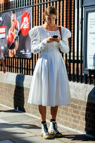 victoria sekrier, white dress, mid long dress, balloon sleeves, brown scale sunglasses, celine sunglasses, hoop earrings, golden earrings, long sleeves dress, brown leather bag, louis vuitton boots, louis vuitton sneakers, high sneakers, laced shoes, white leather shoes, white leather sneakers, golden sole, fashion week, frenchystyle, FW, jonathan paciullo, street style, vertical, full length