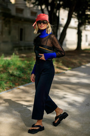 xenia adonts, prada hat, red hat, black top, sheer top, blue pullover, blue top, high collar top, turtleneck top, turtleneck pullover, black leather clutch, black pants, black leather sandals, black leather slippers, big sole sandals, PARIS, PFW, SPRING SUMMER 2020, SS 20, fashion week, frenchystyle, FW, jonathan paciullo, street style, vertical, full length