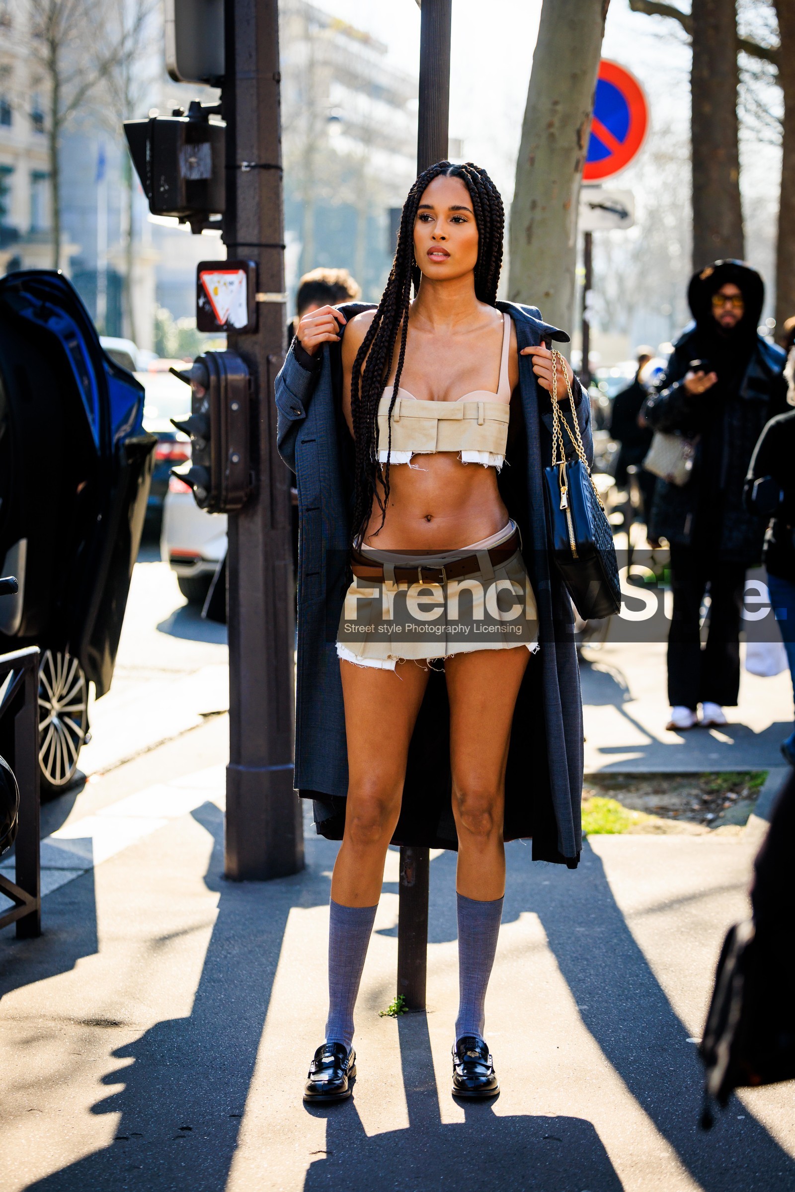 mini skirt, beige skirt, pleated skirt, miu miu, brown belt, beige bra, belt bra, grey coat, long braid, braided hair, black handbag, grey socks, black mocassins, model, cindy bruna, FW 22-23, FALL WINTER 2022_2023, AUTUMN WINTER 2022-2023, fashion week, frenchystyle, FW, jonathan paciullo, street style, PFW, PARIS, full length, vertical