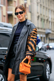 gala gonzalez, black sunglasses, black leather jacket, black leather skirt, animal skin skirt, animal skin jacket, animal print jacket, navy blue top, turtleneck top, square shape glasses, mini skirt, orange leather bag, hand bag, chanel bag, quilted bag, fashion week, frenchystyle, FW, jonathan paciullo, street style, MFW, MILAN, SPRING SUMMER 2020, SS 20