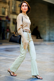 acne studios look, acne studios blouse, acne studios shirt, acne studios pants, green leather pants, beige leather pants, beige blouse, drape blouse, cropped blouse, used blouse, flare pants, patchwork pants, kaki leather belt, golden buckle shoes, golden buckle belt, black leather bag, shoulder bag, hermes bag, kelly hermes bag, kitten heels slippers, kitten heels sandals, multi straps sandals, multi straps slippers, animal skin belt, eva geraldine fontanelli, geraldine boublil, fashion week, frenchystyle, FW, jonathan paciullo, street style, PFW, PARIS, SPRING SUMMER 2022, SS 22, vertical, full length