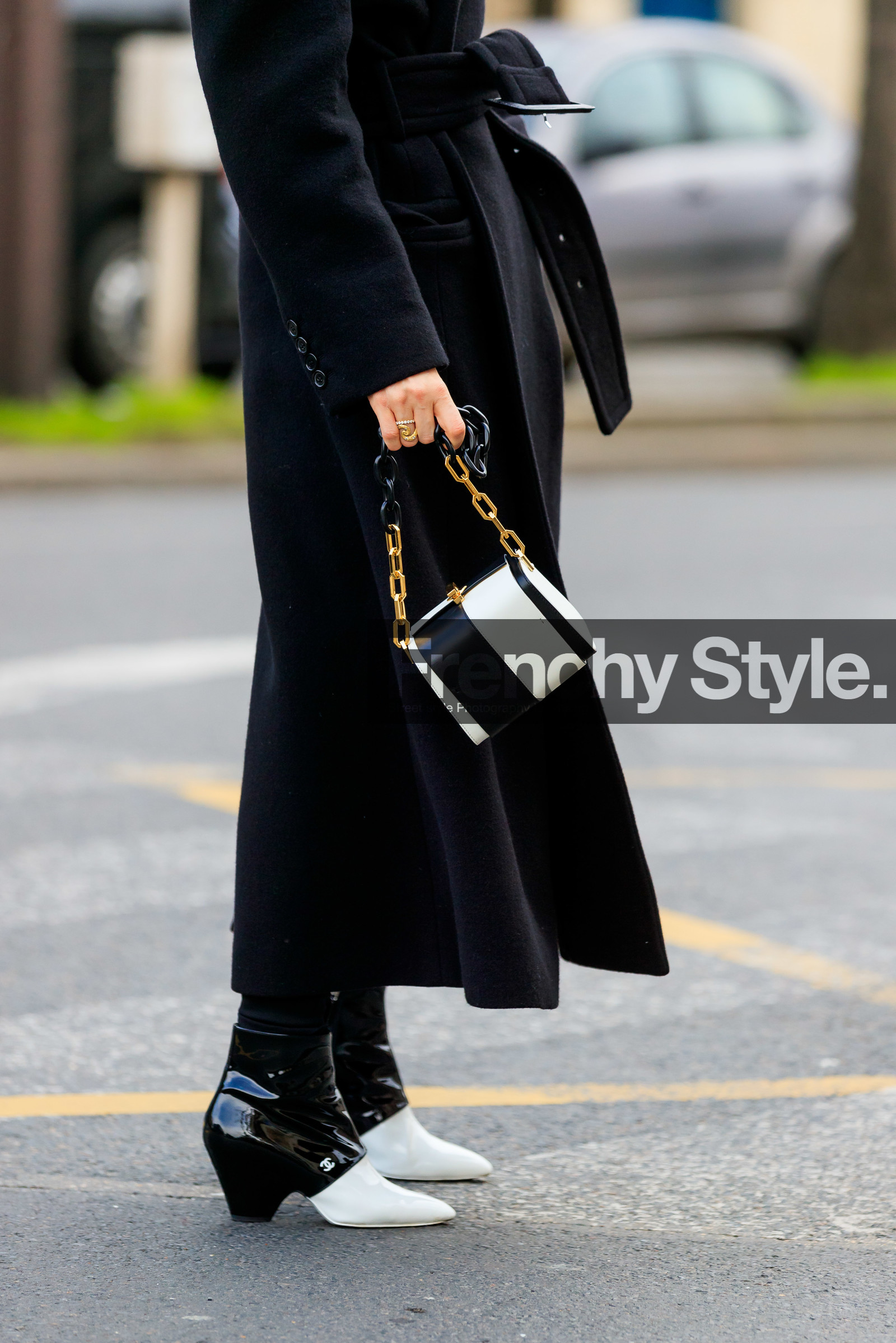 pernille teisbaek, black coat, belted coat, black leather bag, black polish boots, black vinyl boots, white vinyl boots, vinyl boots, polish boots, low boots, kitten heels boots, bicolor boots, chanel boots, bicolor bag, golden chain strap bag, checked bag, striped bag, close up detail, bag detail, shoes detail, hand bag, fashion week, frenchystyle, FW, jonathan paciullo, street style, PFW, PARIS, AUTUMN WINTER 2020-2021, FALL WINTER 2020-2021, FW 20-21, vertical, atmosphere details, detail