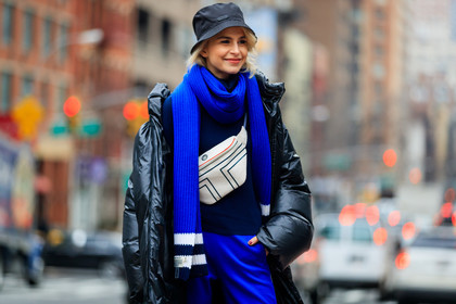 black coat, black hat, blue pants, blue scarf, down jacket, fanny pack, graphic bag, leather bag, navy sweater, prada, printed bag, sweatpants, tory burch, trousers, white bag, street style, jonathan paciullo, FW, frenchystyle, fashion week, NYFW, NEW YORK, AUTUMN WINTER 2018-2019, AW 18-19, FALL WINTER 2018-2019, FW 18-19, atmosphere details, horizontal, detail, caro daur